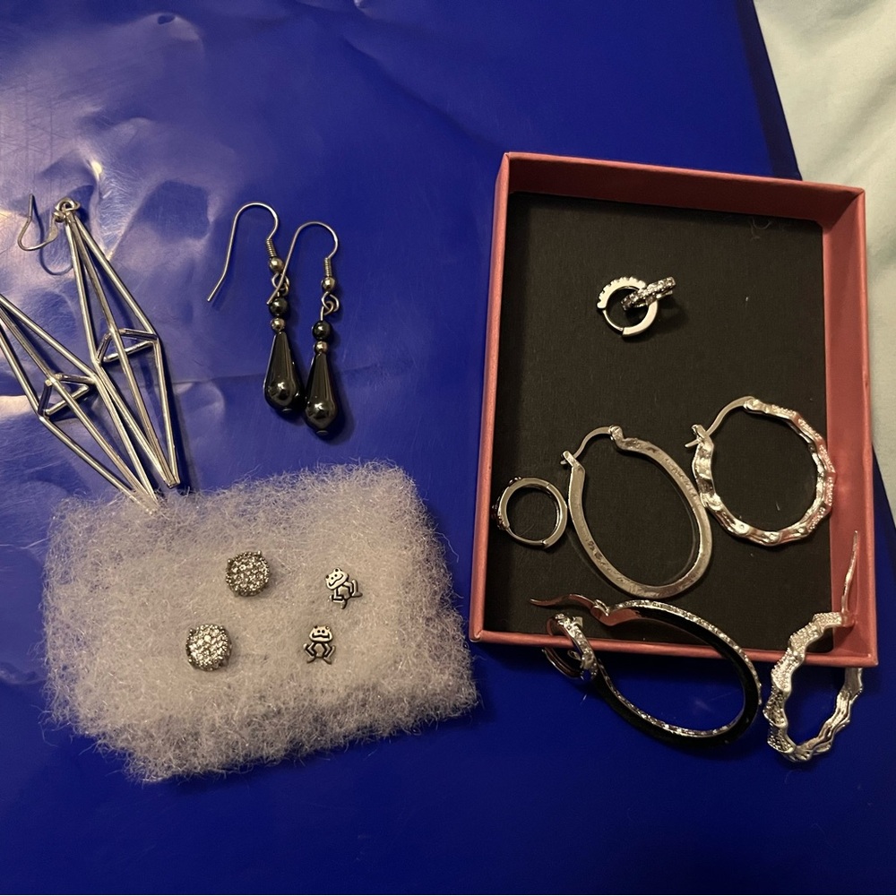 8 pairs of Elegant Silver tone earrings mostly hoops style